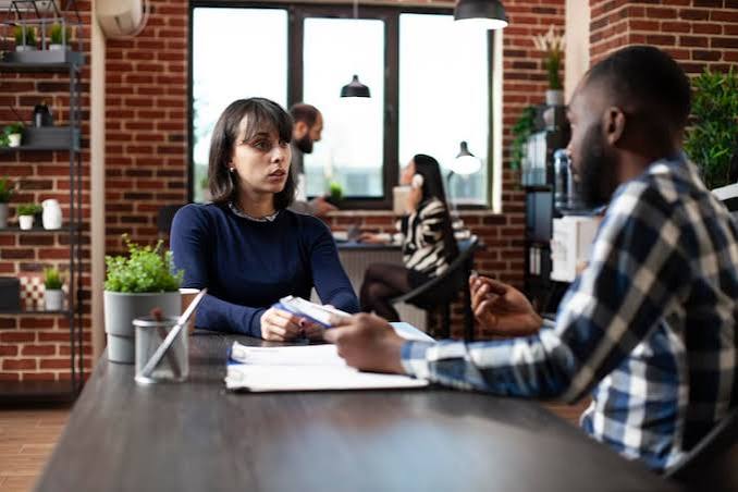 A structured interview across a table